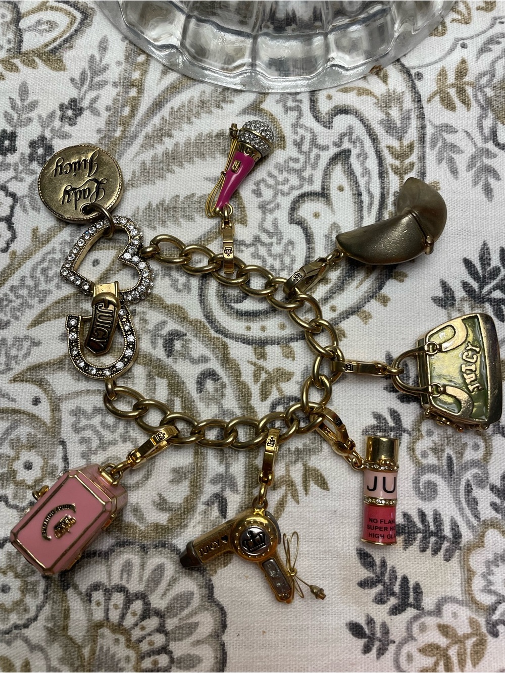 Juicy Couture Gold-Tone Charm Bracelet with Pink Enamel Accents